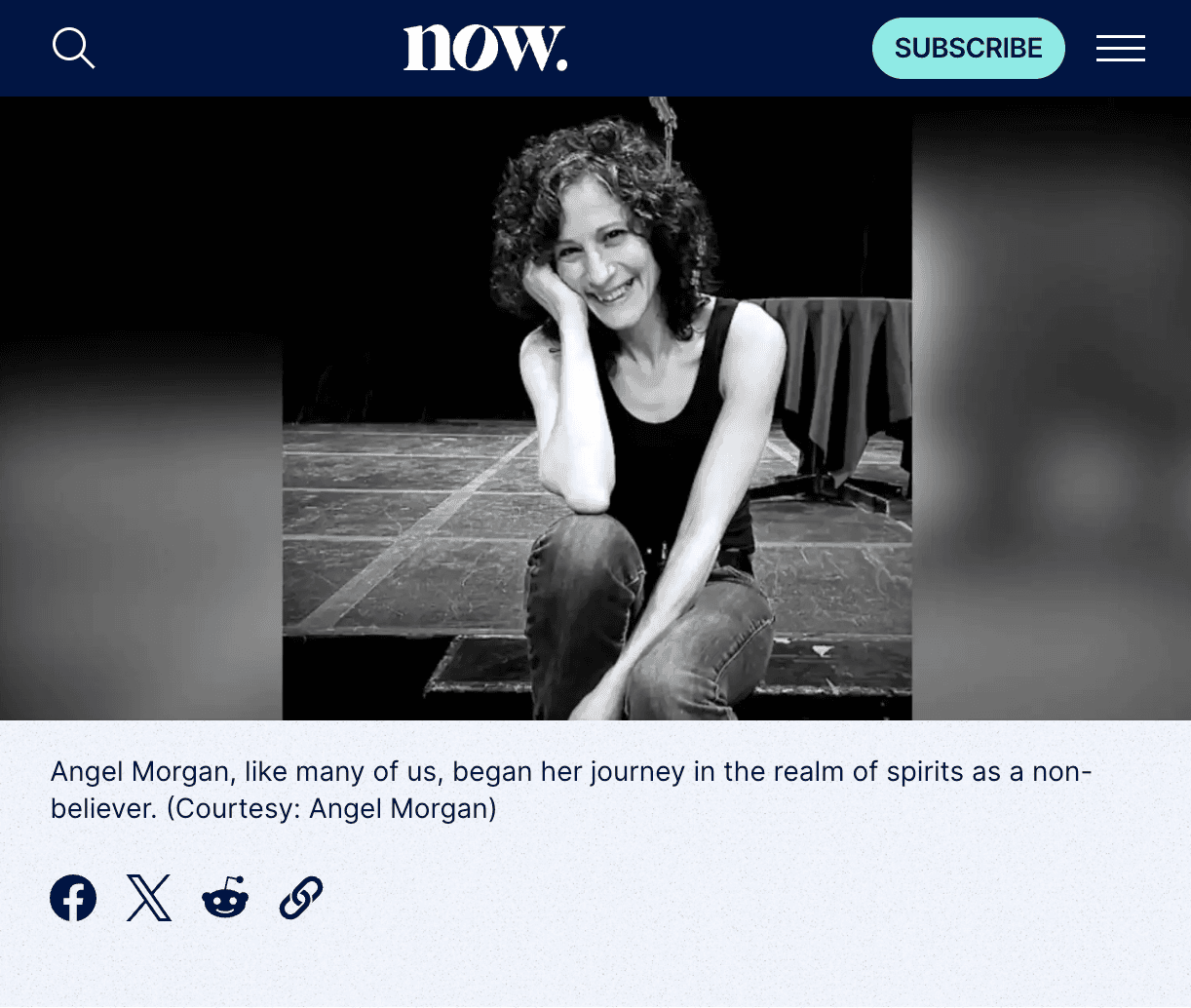 Angel Morgan, Toronto psychic medium, in warm amber light.